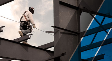 roofer walking on a beam